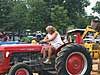 Heather Green gets ready to pull MF35 while her father, Ralph Henson, looks on and ready to follow with tractor and roller. Click here!